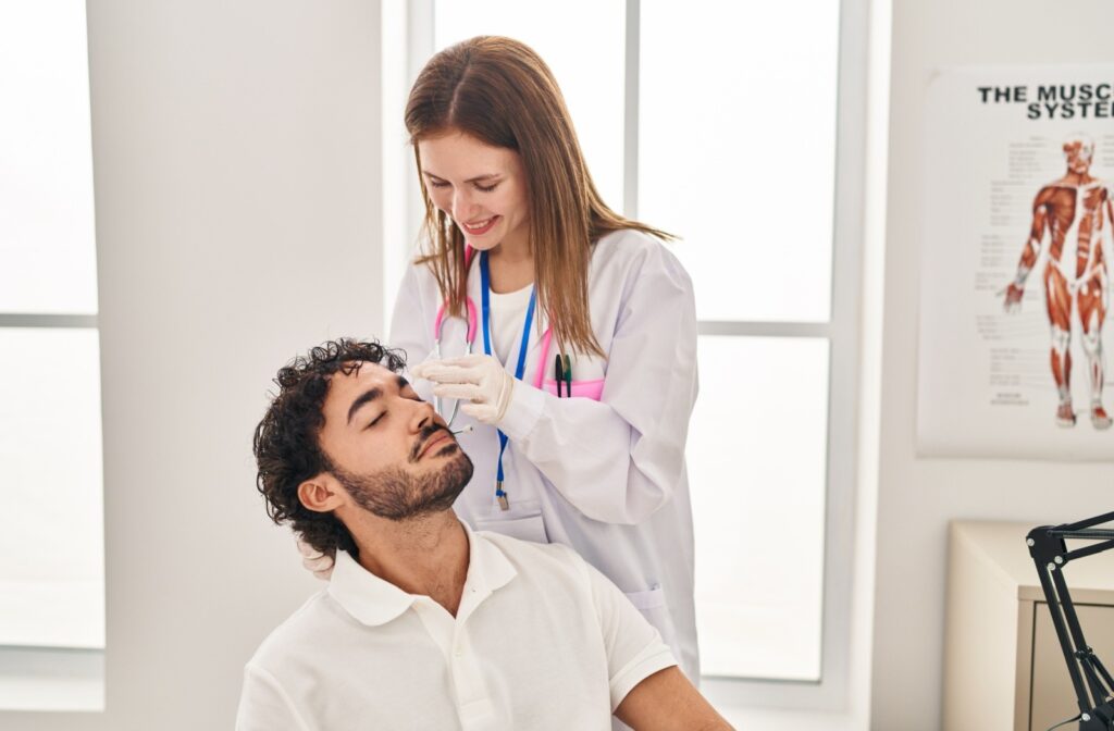 Patient getting their dry eyes assessed by an optometrist